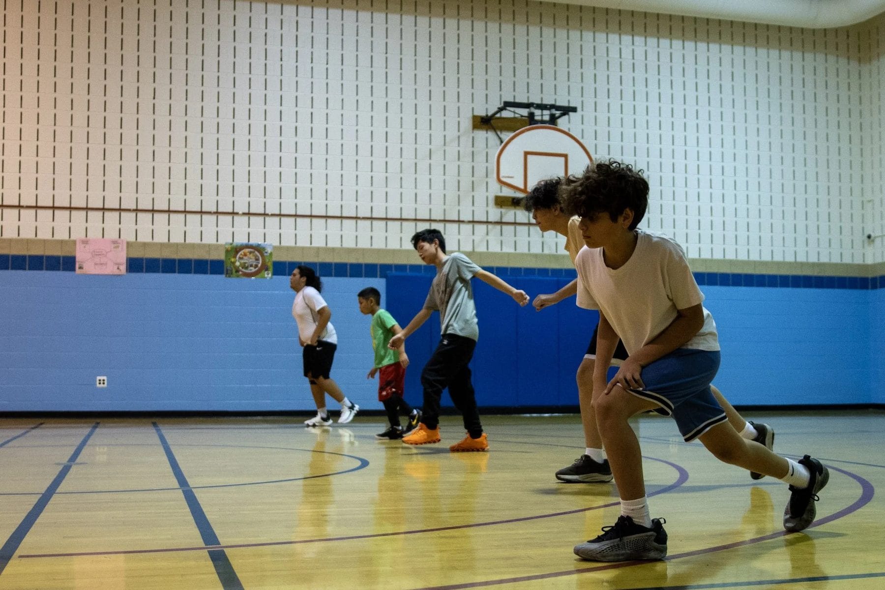 A group clinic running a full-court drill in Rockville