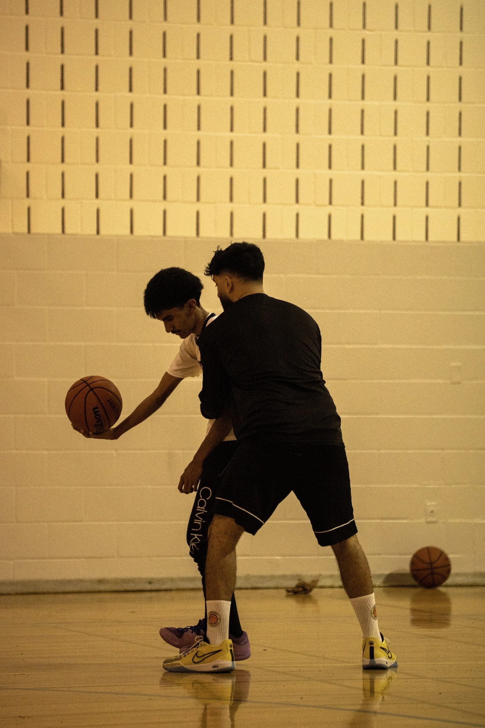 An athlete working on a change-of-direction dribble series